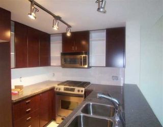 Photo 2: 415 6888 Southpoint Drive in Burnaby: South Slope Condo for sale (Burnaby South)  : MLS®# V599664