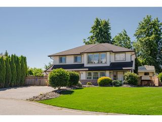 Photo 1: 34658 CURRIE Place in Abbotsford: Abbotsford East House for sale : MLS®# R2714683