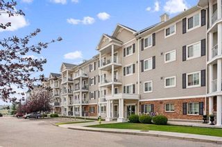 Photo 1: 3215 10 Country Village Park NE in Calgary: Country Hills Village Apartment for sale : MLS®# A2091702