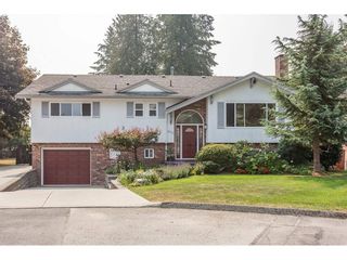 Photo 1: 319 MOUNT ROYAL Place in Port Moody: College Park PM House for sale : MLS®# R2298047
