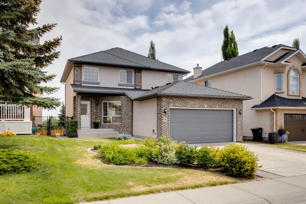 Main Photo: 56 Strathridge Close SW in Calgary: Strathcona Park Detached for sale : MLS®# A1245325