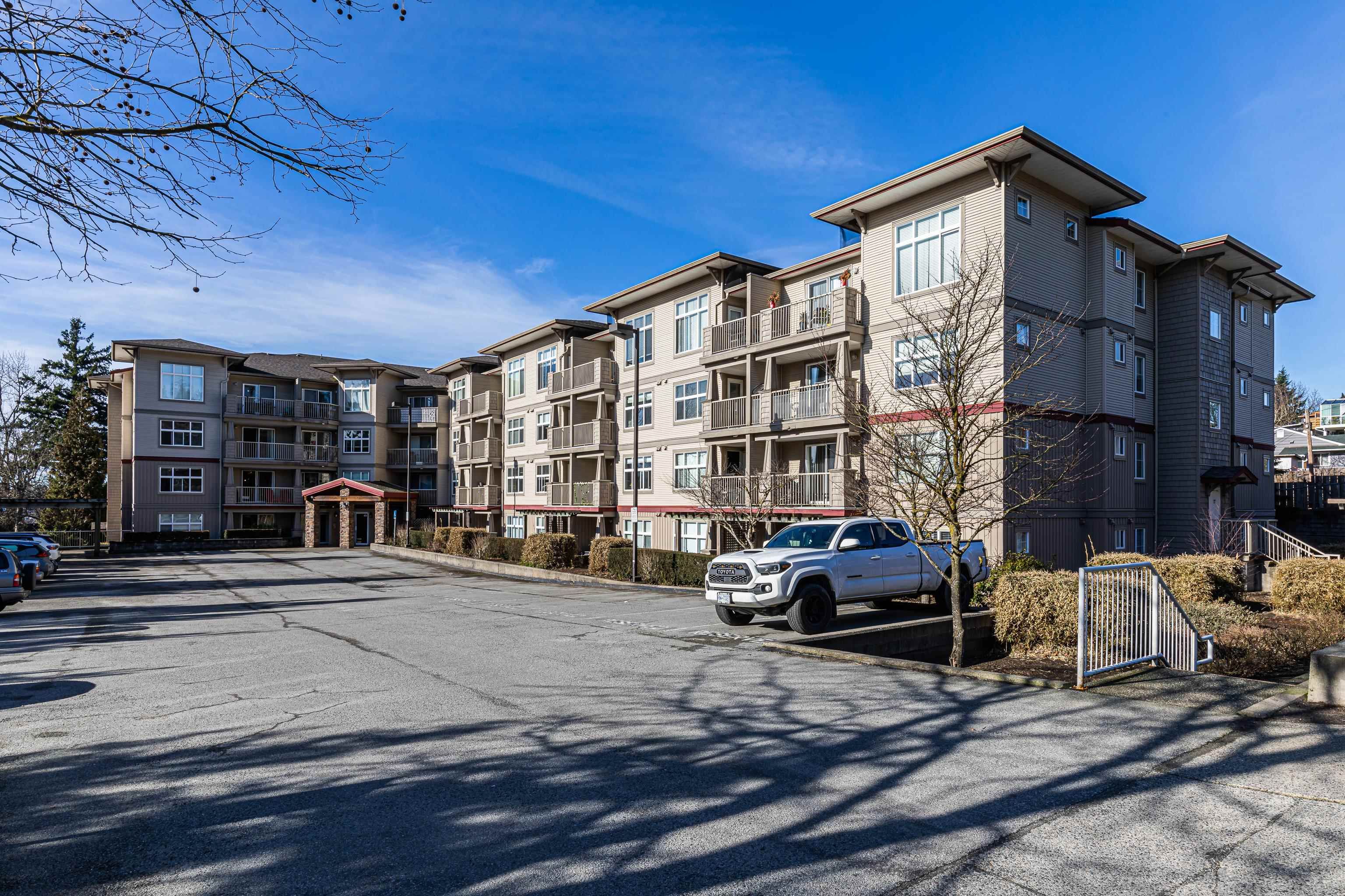 Main Photo: 201 2515 PARK Drive in Abbotsford: Central Abbotsford Condo for sale in "VIVA ON PARK" : MLS®# R2651758