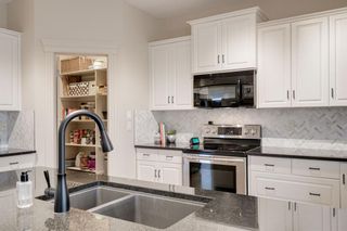 Photo 5: 83 Springborough Green SW in Calgary: Springbank Hill Detached for sale : MLS®# A1197320