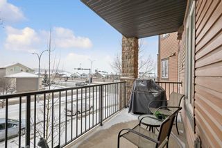 Photo 3: 3204 15 Sunset Square: Cochrane Apartment for sale : MLS®# A2129255