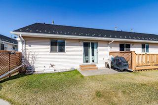 Photo 23: 14 209 Woodside Drive NW: Airdrie Row/Townhouse for sale : MLS®# A1211834