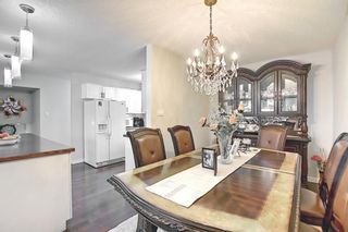 Photo 10: 28 Queen Isabella Close SE in Calgary: Queensland Detached for sale : MLS®# A1208214