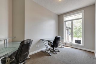 Photo 14: 124 Cougartown Close SW in Calgary: Cougar Ridge Detached for sale : MLS®# A2051695