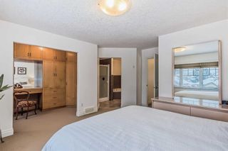 Photo 25: 235 21 Avenue NW in Calgary: Tuxedo Park Semi Detached (Half Duplex) for sale : MLS®# A2105645
