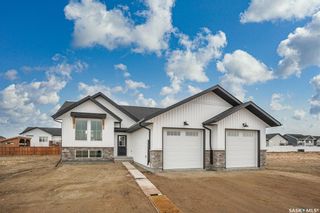 Photo 1: 606 Weir Crescent in Warman: Residential for sale : MLS®# SK927305