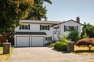 Photo 1: 3506 197 STREET in Langley: Brookswood Langley House for sale : MLS®# R2721892