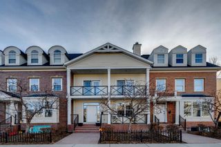 Photo 1: 119 Couture Crescent SW in Calgary: Garrison Green Row/Townhouse for sale : MLS®# A1197042