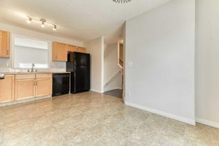 Photo 14: 156 Everhollow Heights SW in Calgary: Evergreen Row/Townhouse for sale : MLS®# A2123116