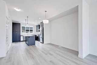 Photo 14: 119 Belvedere Avenue SE in Calgary: Belvedere Row/Townhouse for sale : MLS®# A2056758