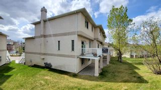 Photo 4: 82 Country Hills Gardens NW in Calgary: Country Hills Row/Townhouse for sale : MLS®# A1209355