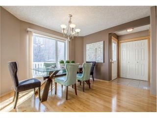 Photo 8: 69 STRATHLEA Place SW in Calgary: Strathcona Park House for sale : MLS®# C4101174