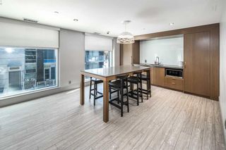 Photo 6: 402 118 Waterfront Court SW in Calgary: Chinatown Apartment for sale : MLS®# A2120171