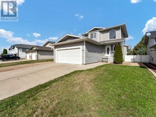 Photo 1: 814 Spruce Way SE in Medicine Hat: House for sale : MLS®# A2080424