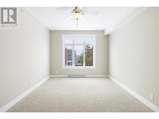Photo 19: 1165 Sutherland Avenue Unit# 406 in Kelowna: House for sale : MLS®# 10312969