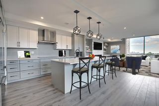 Photo 3: 317 15 Cougar Ridge Landing SW in Calgary: Patterson Apartment for sale : MLS®# A1188800