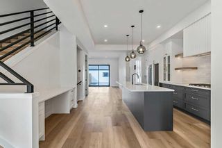 Photo 6: 420 24 Avenue NE in Calgary: Winston Heights/Mountview Semi Detached (Half Duplex) for sale : MLS®# A2115046