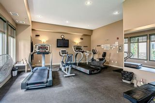 Photo 25: 3303 92 Crystal Shores Road: Okotoks Apartment for sale : MLS®# A1245772