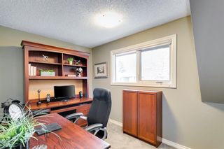 Photo 25: 827 Coach Side Crescent SW in Calgary: Coach Hill Detached for sale : MLS®# A2002731