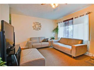 Photo 3: 4232 7 Avenue SW in Calgary: Rosscarrock House for sale : MLS®# C4078756