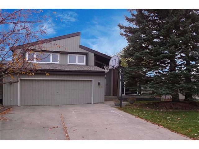 Main Photo: 128 PUMP HILL Green SW in Calgary: Pump Hill House for sale : MLS®# C4037555