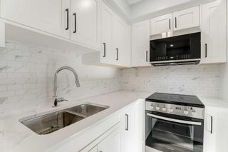 Main Photo: 203 1633 26 Avenue SW in Calgary: South Calgary Apartment for sale : MLS®# A2082443