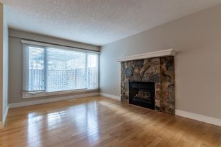 Photo 13: 128 33 Glamis Green SW in Calgary: Glamorgan Row/Townhouse for sale : MLS®# A1173960