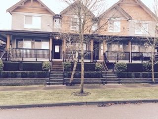 Photo 1: 32 16772 61 Avenue in Surrey: Cloverdale BC Townhouse for sale in "Laredo" (Cloverdale)  : MLS®# R2018427