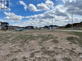 Photo 1: 104 10 Avenue  SE in Drumheller: Vacant Land for sale : MLS®# A1219782
