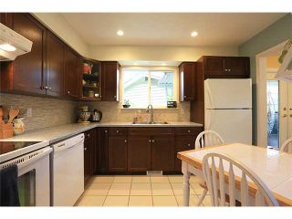 Photo 2: 1906 LODGE PL in Coquitlam: River Springs House for sale : MLS®# V1010766