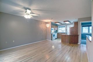 Photo 4: 2623 Dovely Court SE in Calgary: Dover Row/Townhouse for sale : MLS®# A1213020