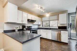 Photo 4: 42 Point Drive NW in Calgary: Point McKay Row/Townhouse for sale : MLS®# A1216632