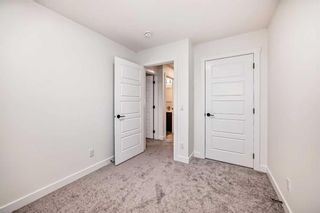 Photo 16: 330 Lucas Avenue NW in Calgary: Livingston Row/Townhouse for sale : MLS®# A2130679