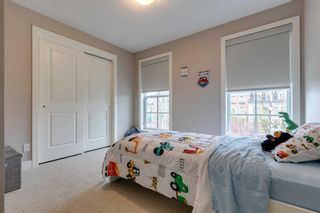 Photo 16: 71 Victoria Cross Boulevard SW in Calgary: Currie Barracks Row/Townhouse for sale : MLS®# A2133859
