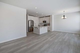 Photo 16: 169 BELMONT Green SW in Calgary: Belmont Detached for sale : MLS®# A2112555