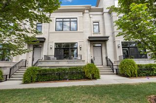 Photo 1: 8 Valour Circle SW in Calgary: Currie Barracks Row/Townhouse for sale : MLS®# A2048511