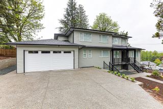 Photo 1: 1930 KAPTEY Avenue in Coquitlam: Cape Horn House for sale in "CAPE HORN" : MLS®# R2874562