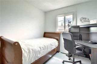 Photo 30: 24 GLAMIS Gardens SW in Calgary: Glamorgan Row/Townhouse for sale : MLS®# A1077235