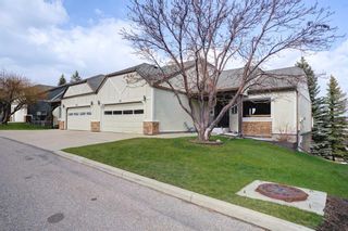 Main Photo: 99 Coach Side Terrace SW in Calgary: Coach Hill Semi Detached (Half Duplex) for sale : MLS®# A2128917