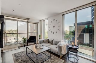 Photo 1: 319 619 CONFLUENCE Way SE in Calgary: Downtown East Village Apartment for sale : MLS®# A2013917