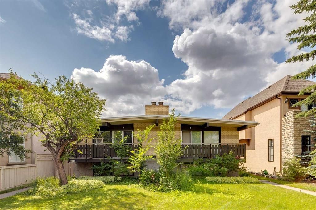Main Photo: 2205 4 Avenue NW in Calgary: West Hillhurst Full Duplex for sale : MLS®# A2063262