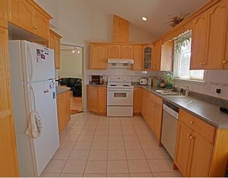 Photo 2: 3061 COAST MERIDIAN Road in Port Coquitlam: Glenwood PQ House for sale : MLS®# V639727