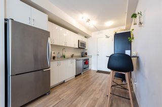 Photo 5: 407 450 8 Avenue SE in Calgary: Downtown East Village Apartment for sale : MLS®# A2040322