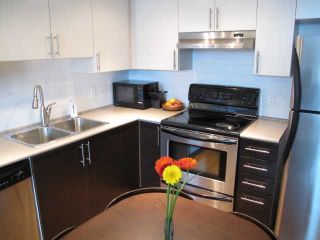 Photo 3: 105 5649 KINGS Road in Vancouver: University VW Townhouse for sale in "GALLERIA" (Vancouver West)  : MLS®# V1000398