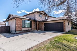 Photo 1: 656 Woodpark Boulevard SW in Calgary: Woodlands Detached for sale : MLS®# A1213690