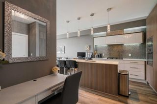 Photo 8: 405 119 19 Street NW in Calgary: West Hillhurst Apartment for sale : MLS®# A2122523
