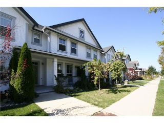 Photo 1: 7035 180TH Street in Surrey: Cloverdale BC Townhouse for sale in "Terraces at Provinceton" (Cloverdale)  : MLS®# F1321637